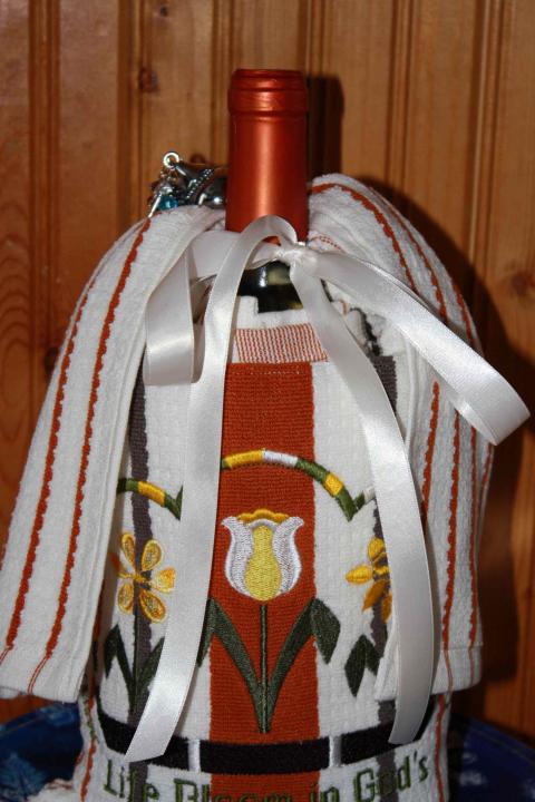 back of towels to wrap the wine bottle gift