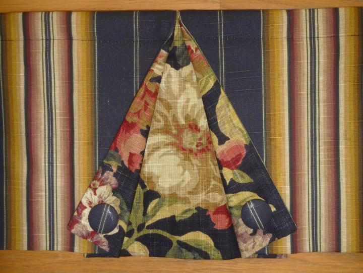 Detail of Valance with button back pleat and contrast opening